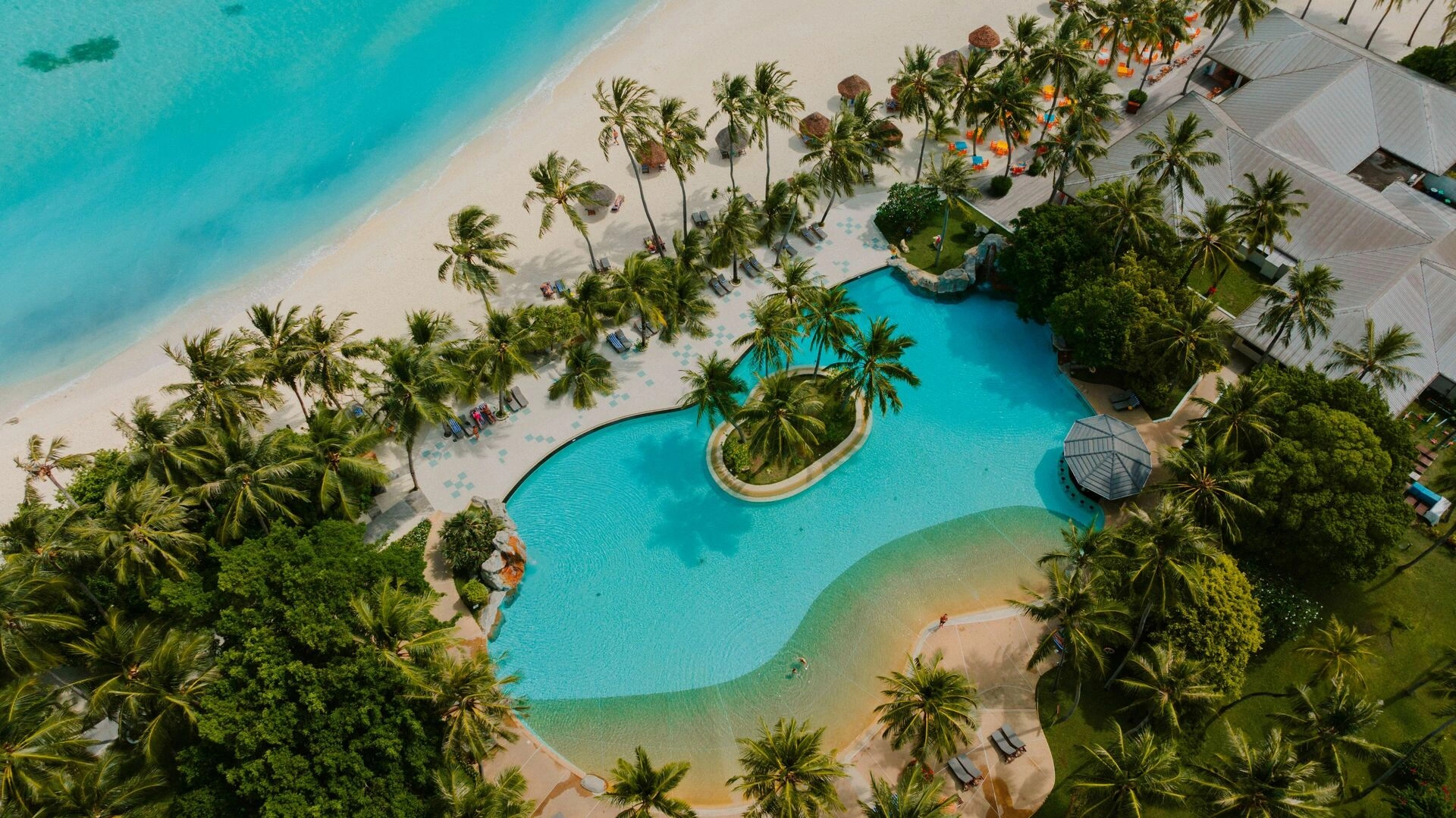 Villa_Park_-_Lifestyle_-_Main_Pool_Aerial_-_4K.jpg