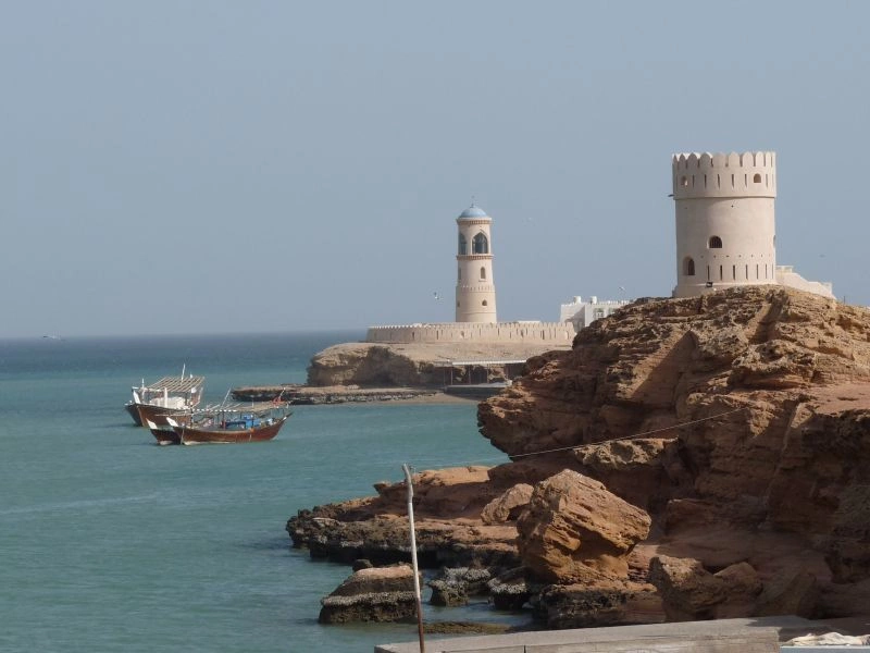 Tower_and_lighthouse,_Sur,_Oman_-_Pixabay.jpg